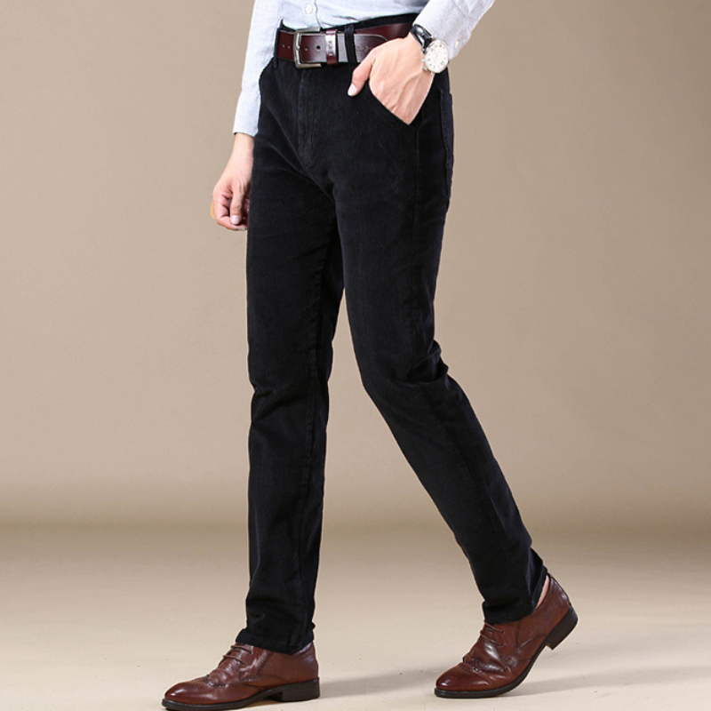 Side view of men's classic textured straight-leg jeans, highlighting comfortable and tailored fit.