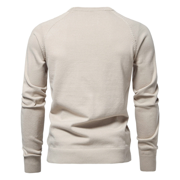 Stylish men's textured waffle knit long sleeve crewneck pullover sweater, versatile fashion.