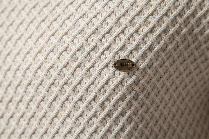 Cozy textured men's waffle knit long sleeve crewneck pullover sweater, fall/winter warmth.