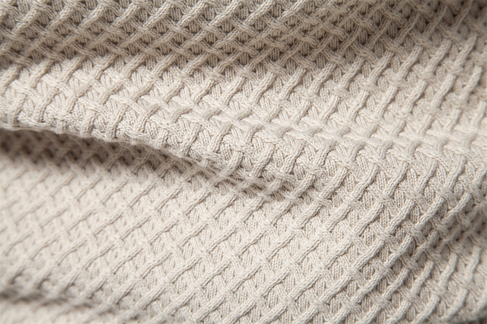 Men's fall fashion textured waffle knit long sleeve crewneck pullover sweater.