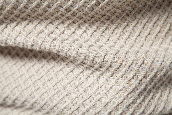 Men's fall fashion textured waffle knit long sleeve crewneck pullover sweater.