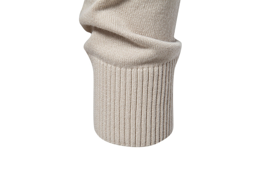 Menswear classic: textured waffle knit long sleeve crewneck pullover sweater, versatile style.