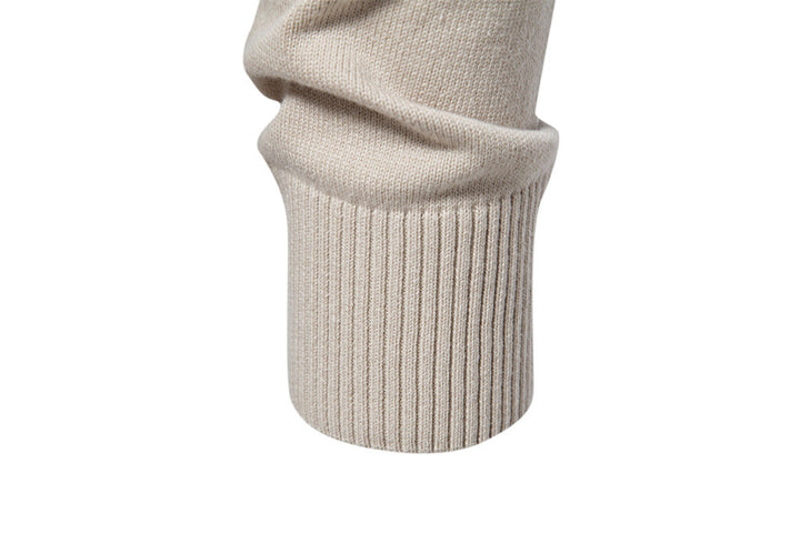 Menswear classic: textured waffle knit long sleeve crewneck pullover sweater, versatile style.