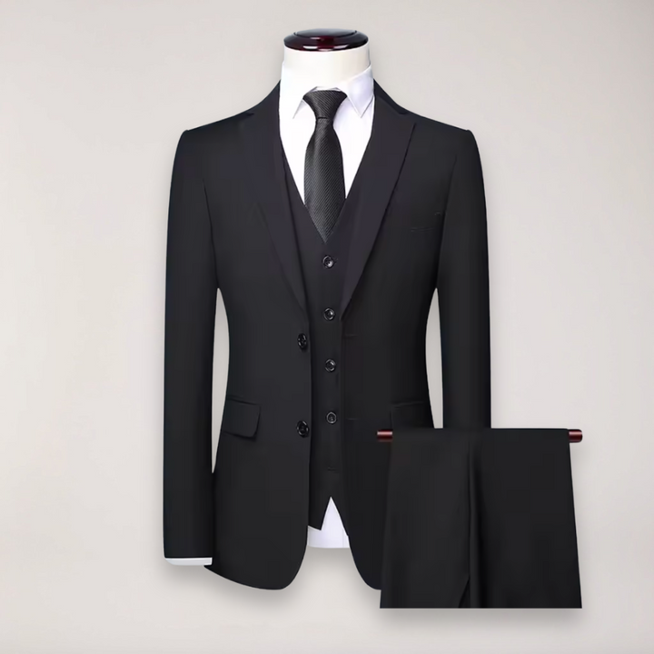 Sophisticated men's classic three-piece suit, perfect for weddings & formal events. Tailored fit.