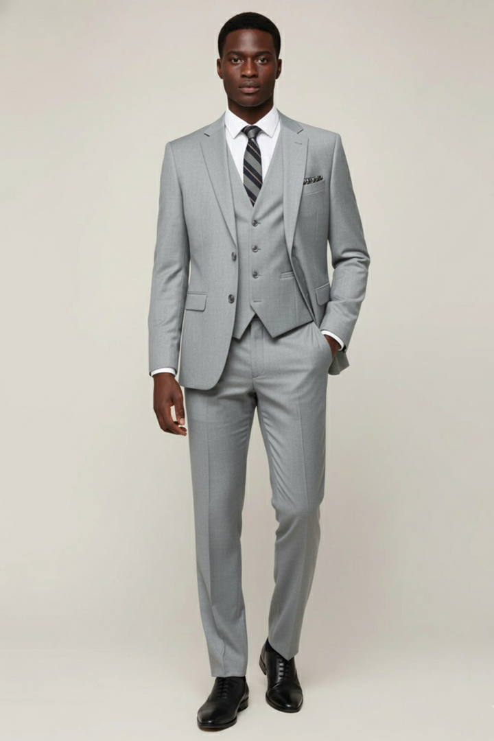 Elegant men's three-piece formal suit. Versatile for business attire, wedding guests, & galas. Classic menswear fashion.