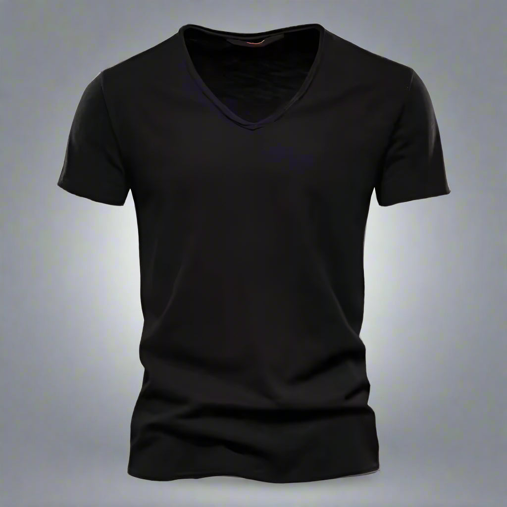Man wearing a slim fit V-neck t-shirt. Comfortable short sleeve tee, ideal for casual everyday style.
