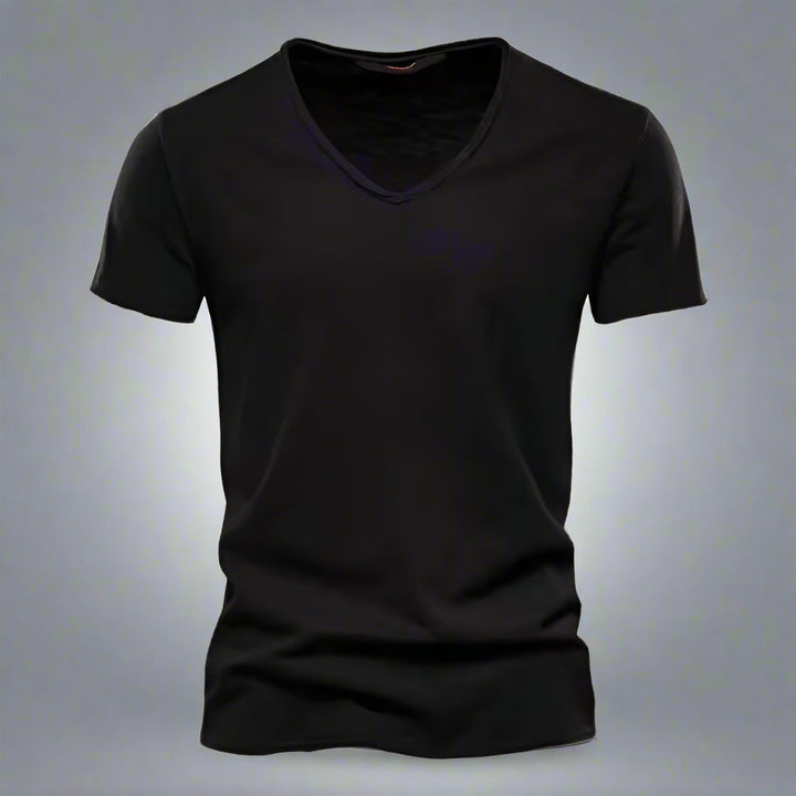 Man wearing a slim fit V-neck t-shirt. Comfortable short sleeve tee, ideal for casual everyday style.