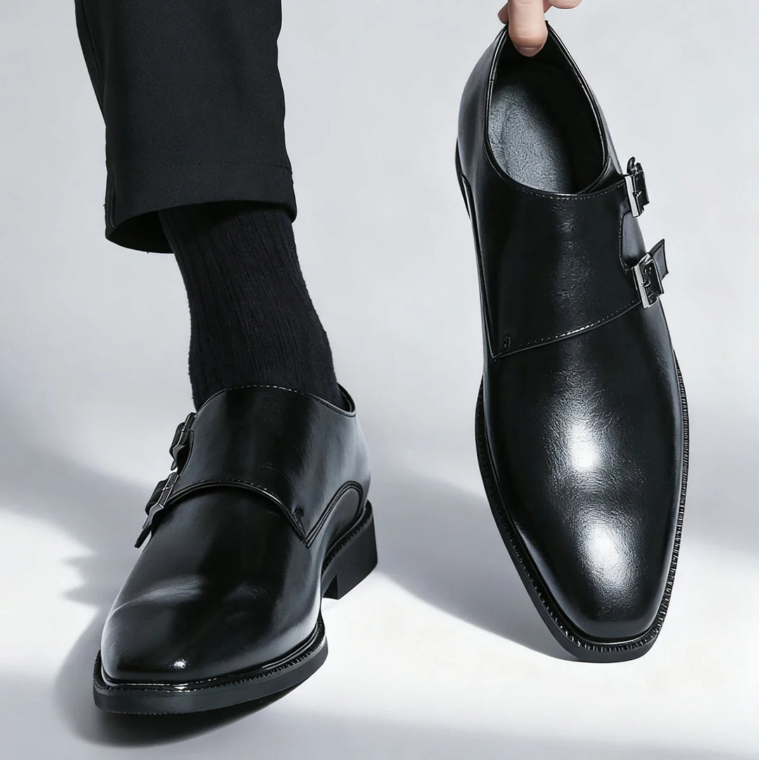 Elegant black Valmont double buckle loafers for men, showcasing refined craftsmanship and classic style.