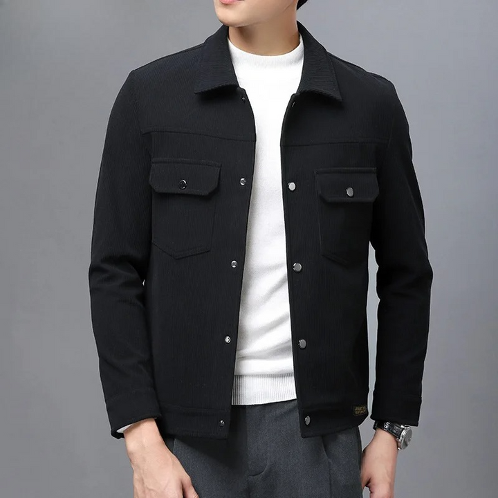 Black men's snap jacket, stylish everyday outerwear. Casual button-up for a modern layered look.
