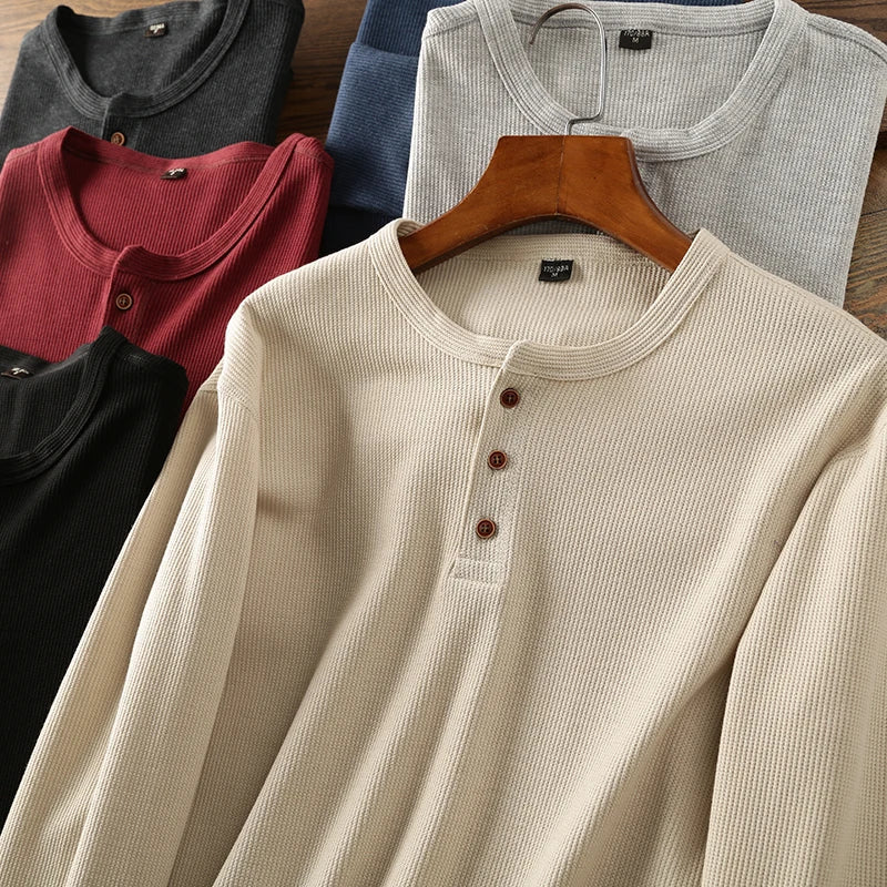 Stylish men's waffle knit long sleeve shirt, featuring a comfortable fabric texture.