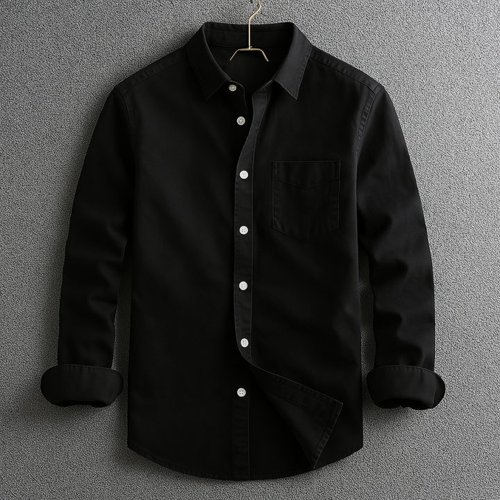 Men's classic white Oxford button-down shirt. Long sleeve smart casual menswear, perfect for versatile everyday wear.