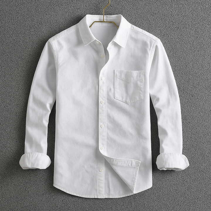 Relaxed men's long sleeve Oxford shirt, unbuttoned for casual wear. Classic button-down menswear for everyday style.