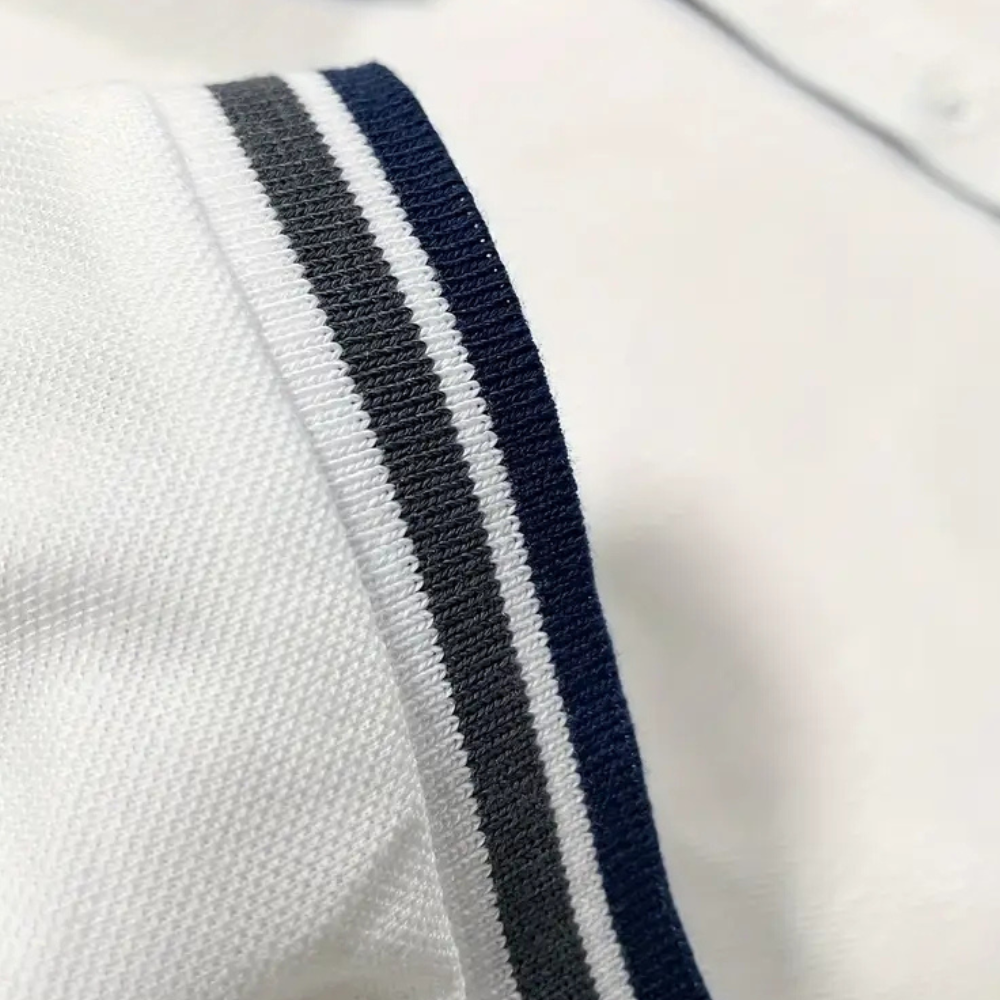 Versatile white men's polo shirt, a trendy polyester classic for casual wear & men's fashion.