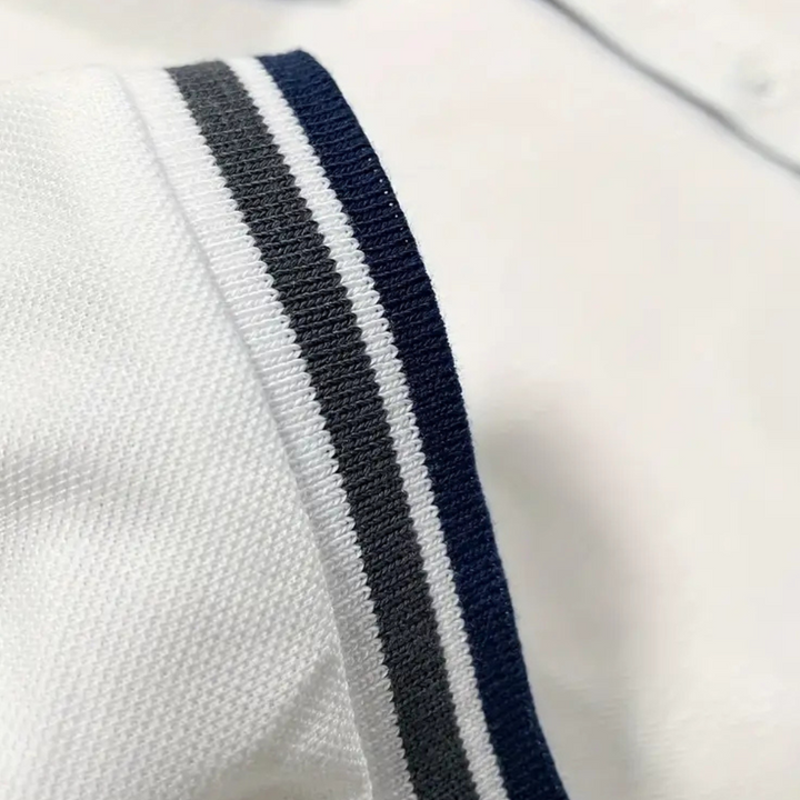 Versatile white men's polo shirt, a trendy polyester classic for casual wear & men's fashion.