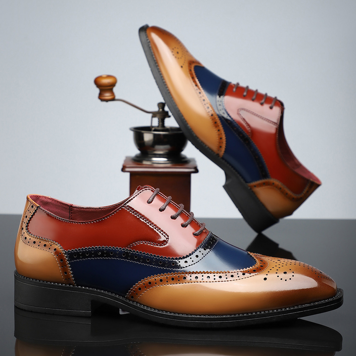 Elegant men's brown wingtip brogues, perfect for office wear or special occasions.