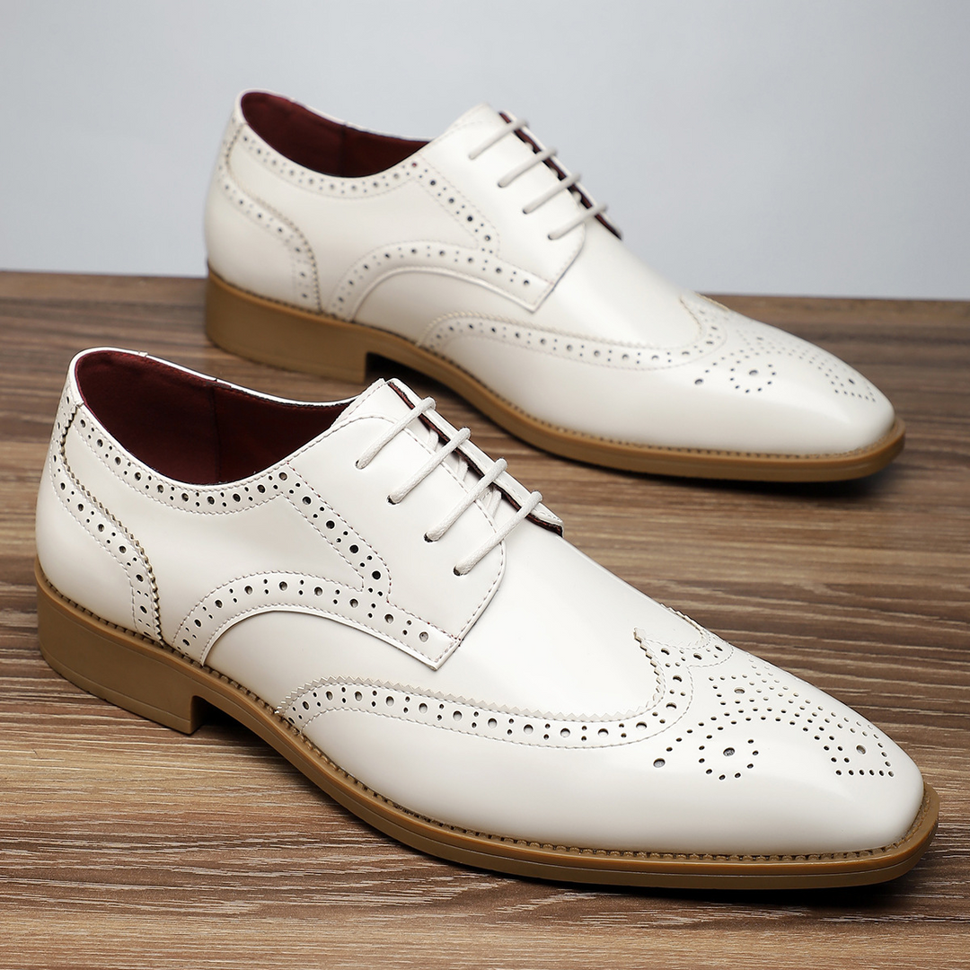 Men's classic wingtip brogues, the ultimate footwear for a distinguished formal look.
