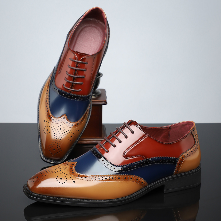 Stylish men's formal black wingtip brogue shoes with polished leather finish.