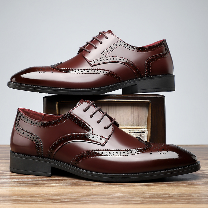 Polished men's wingtip brogue formal shoes, enhancing any elegant outfit.