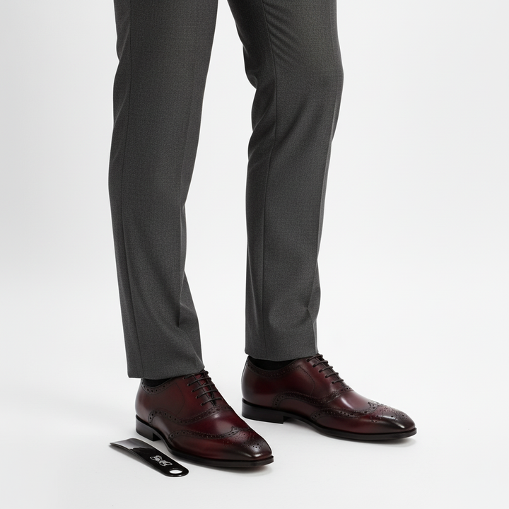 Tan leather men's Oxford dress shoes with intricate brogue patterns, Clinton handcrafted luxury