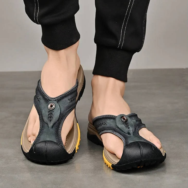 Water resistant men's closed toe sandals with non-slip sole for secure footing on wet surfaces & outdoor trails.