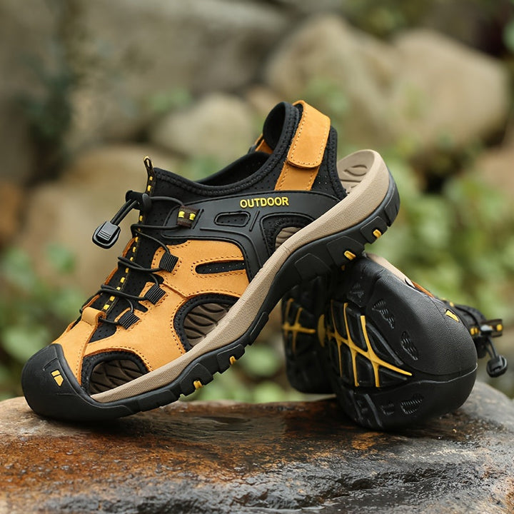Rugged men's closed-toe adventure sandals, perfect for hiking with adjustable fit and secure grip.