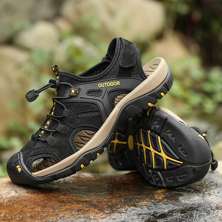 Side view of men's closed-toe hiking sandals, showing secure design and traction for trails.