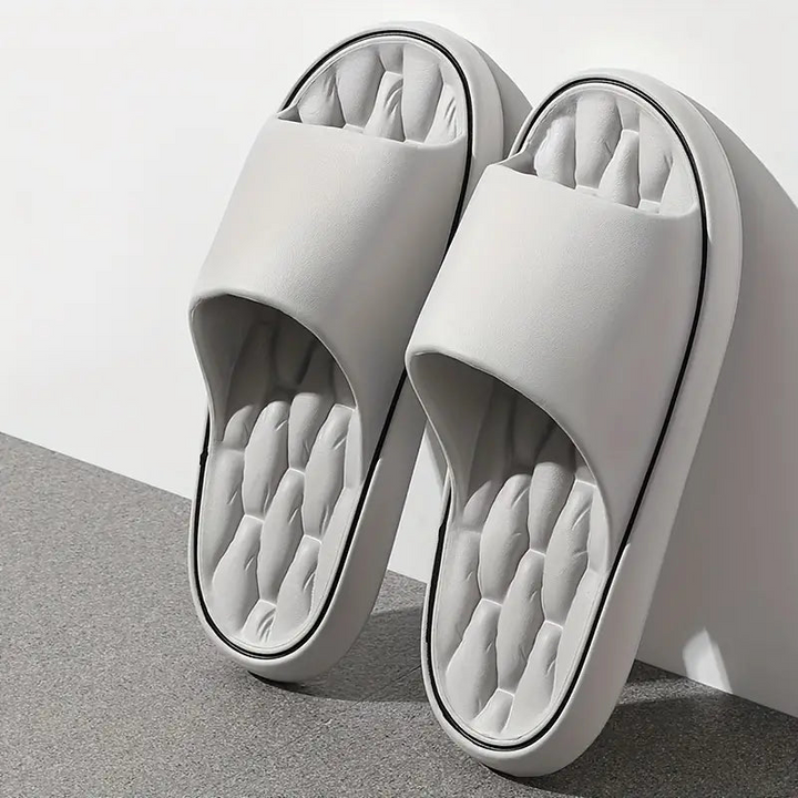 Men's water-resistant Cloud Cushion Pillow Slides. Perfect for beach, pool, or casual summer wear. Slip-on design.