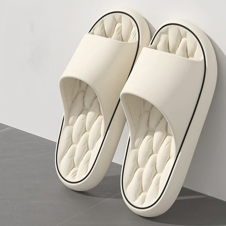 Close-up of men's Cloud Cushion Pillow Slides. Thick, cushioned sole for ultimate comfort. Lightweight slip-on design.