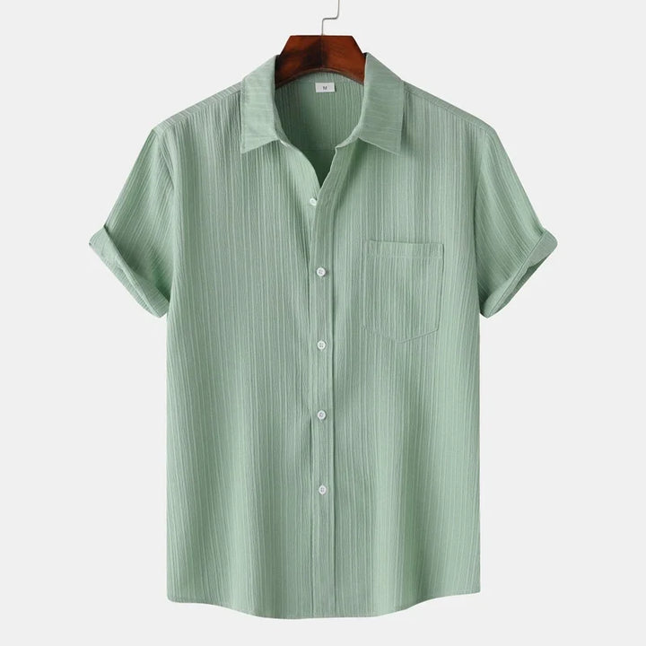 Versatile men's summer button-up shirt. Great for casual outings, beach trips or relaxed vacation style.