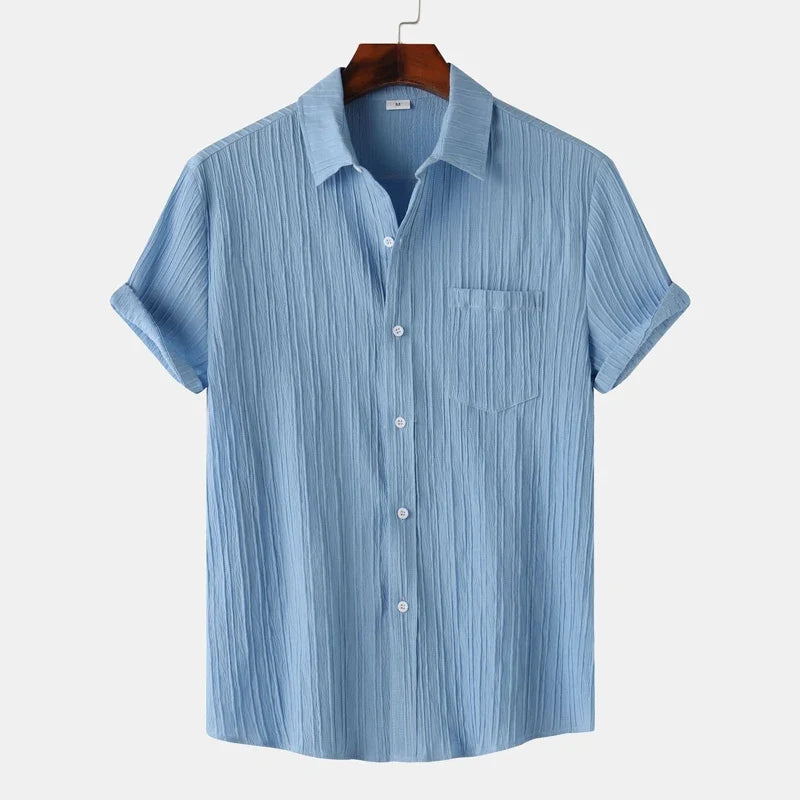 Men's stylish long sleeve button-up shirt. Breathable & perfect for summer coastal fashion & comfort.