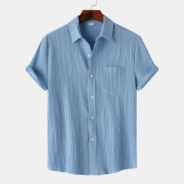 Men's stylish long sleeve button-up shirt. Breathable & perfect for summer coastal fashion & comfort.