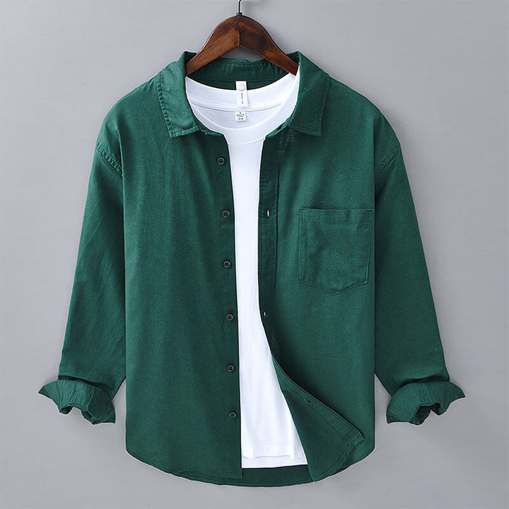Relaxed fit men's button-down shirt in coastal style, ideal for elegant summer menswear.