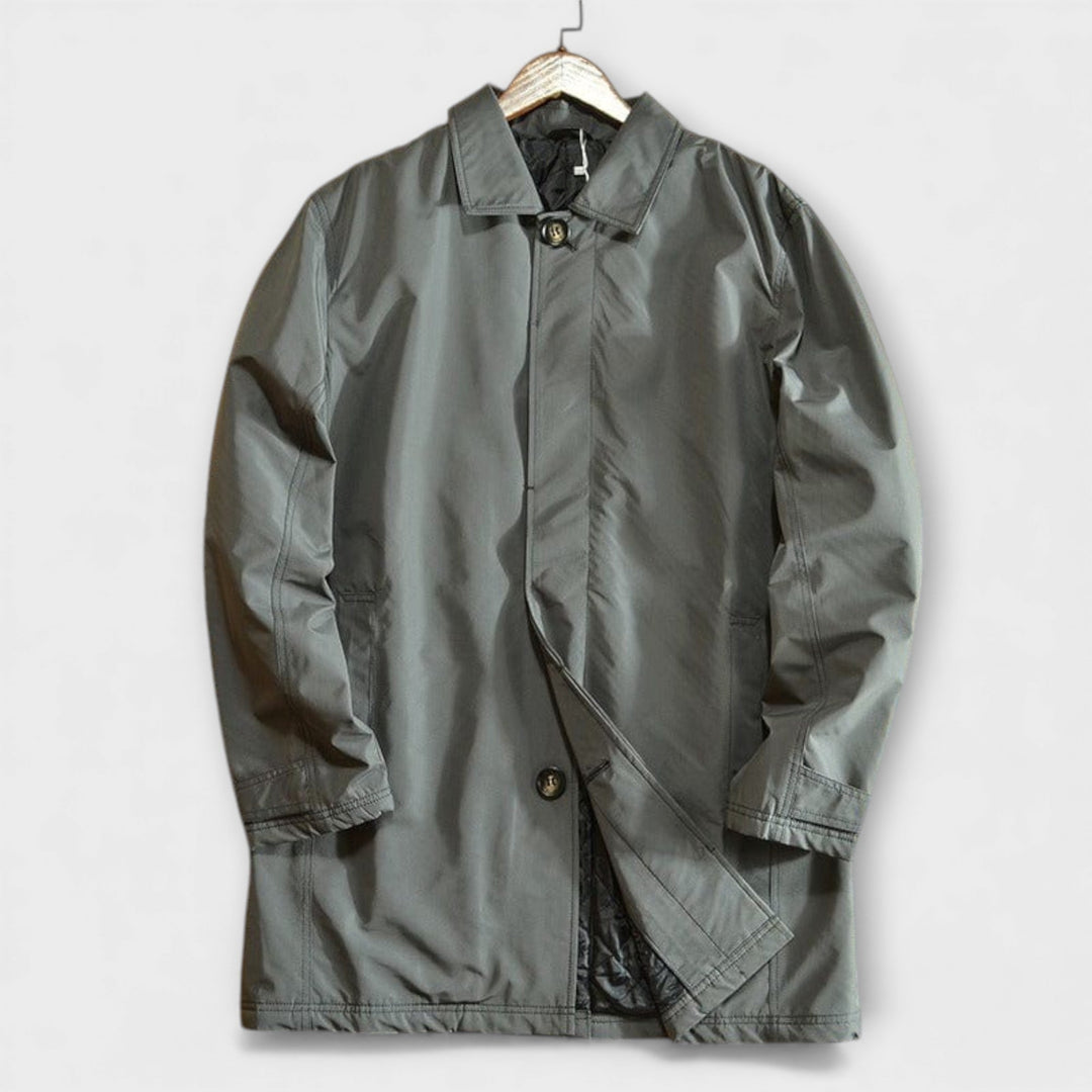 Lightweight men's rain jacket, windbreaker for all-weather protection. Coastal style outerwear for men's fashion.