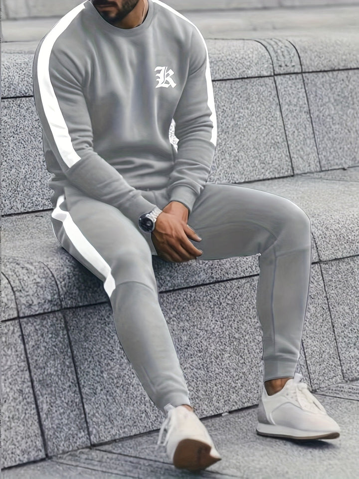 Stylish men's color block athletic set featuring a comfortable sweatshirt and joggers.