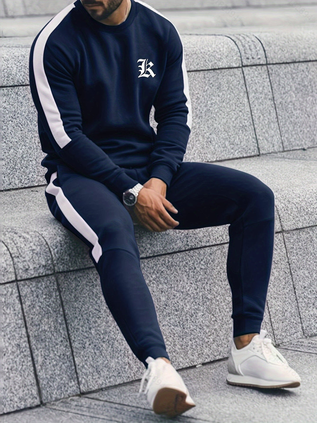 Modern men's color block activewear set, a fashionable sweatshirt and joggers combination.