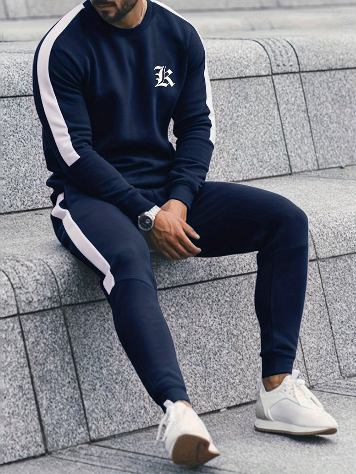 Modern men's color block activewear set, a fashionable sweatshirt and joggers combination.
