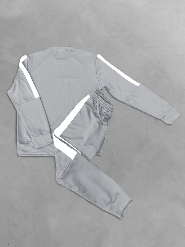 Men's fashion color block tracksuit set, an essential activewear choice for modern men.