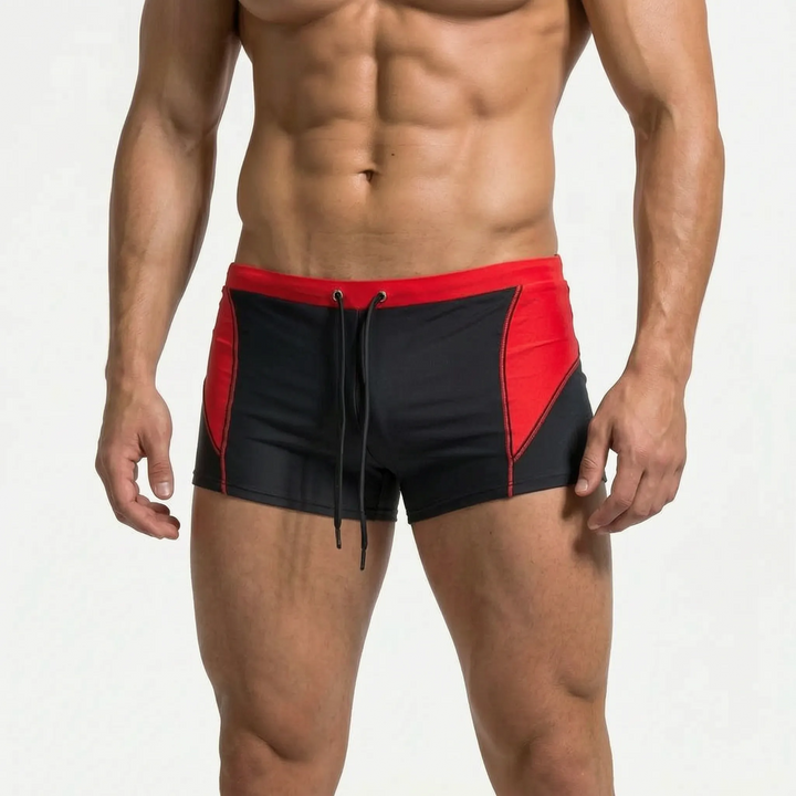 Men's color block boxer swim trunks. Athletic design, ideal for swimming, beach, & watersports.