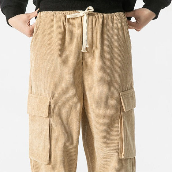 Practical men's utility pants, comfort fit cargo style with a functional drawstring waist.