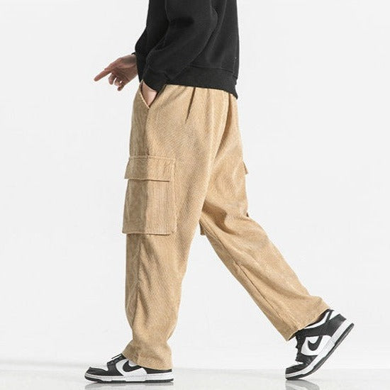 Close-up of men's cargo pants drawstring waist & fabric texture, highlighting comfort details.