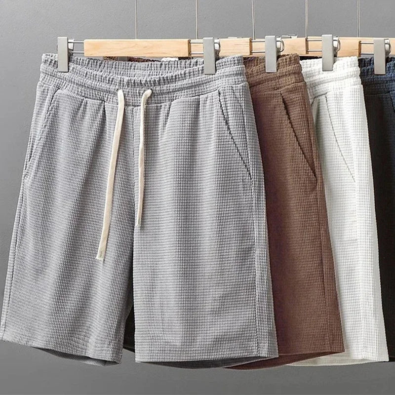 Men's comfort waffle knit lounge shorts with pockets, perfect for casual wear and everyday comfort.