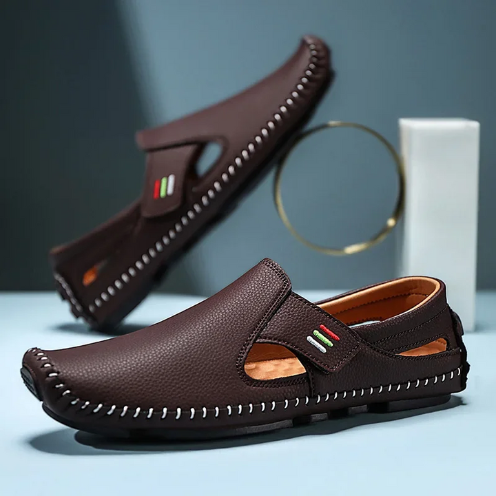 Supportive men's open-toe sandals, adjustable and comfortable for everyday summer adventures.