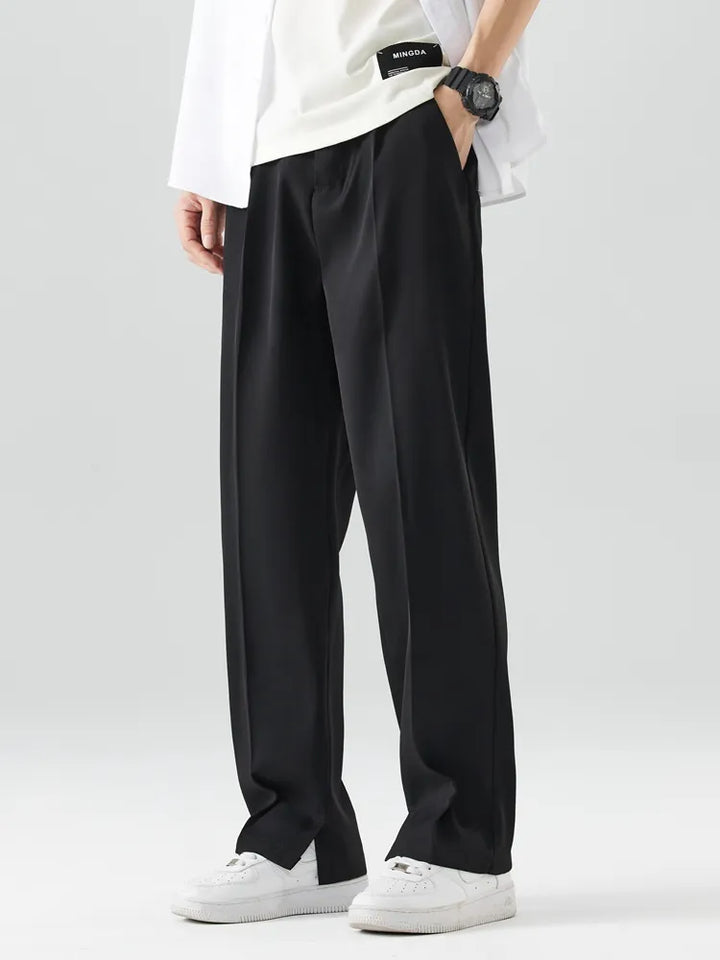 Comfortable men's stretch athletic pants with a relaxed fit & tapered leg, ideal for active or casual wear.