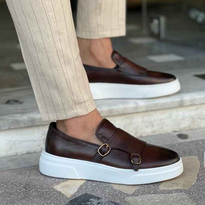 Men's comfortable black leather slip-on loafers, ideal for effortless casual & everyday wear.