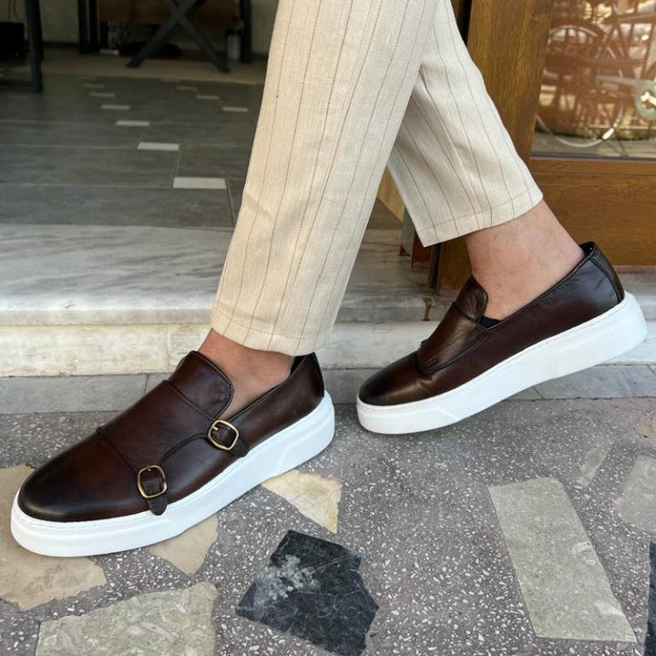 Lorenzo men's black slip-on loafers. Comfortable leather footwear with timeless style for any man's fashion.