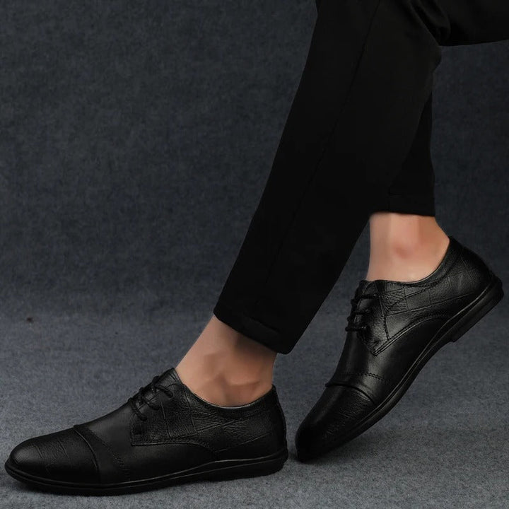 Men's formal black dress shoes, comfortable professional footwear for elegant events.