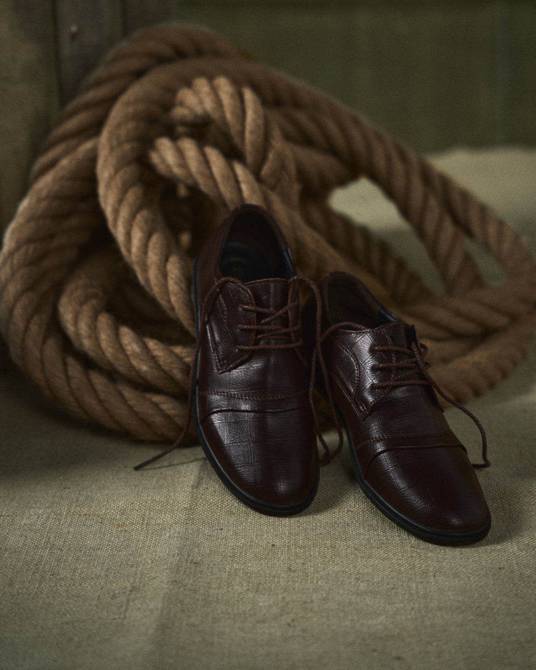 Comfortable men's brown leather dress shoes, perfect for all-day professional wear and work.