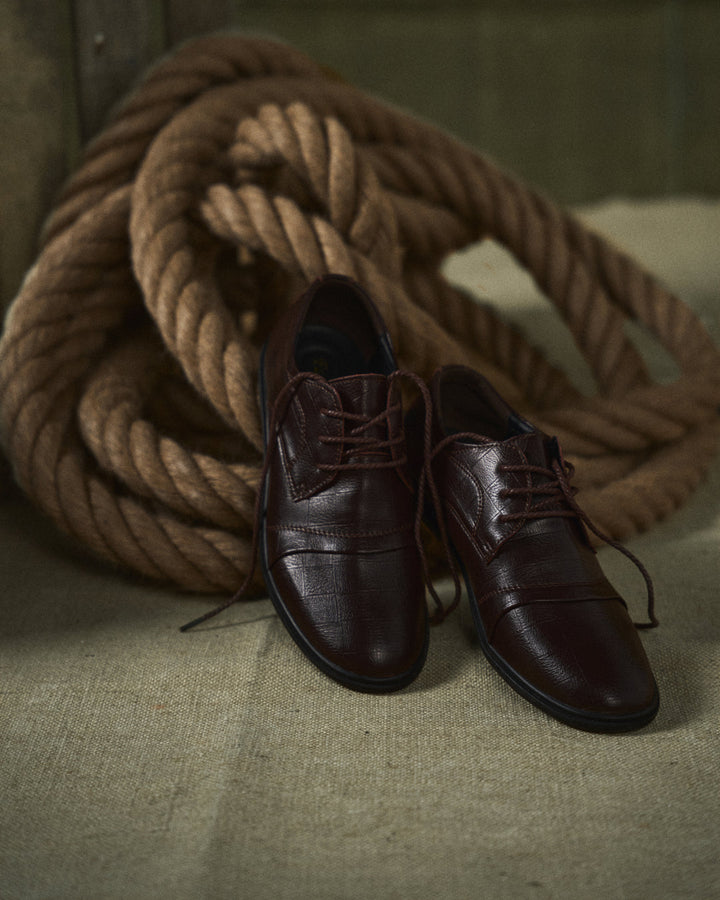 Comfortable men's brown leather dress shoes, perfect for all-day professional wear and work.