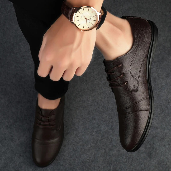 Classic men's brown dress shoes, comfortable and professional for business & formal occasions.