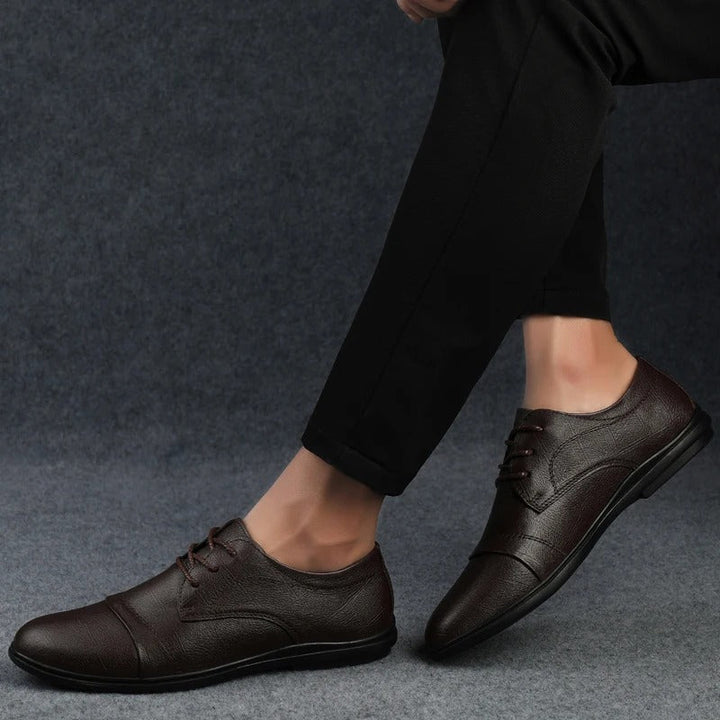 Men's comfortable black Oxford dress shoes, professional and stylish for the workplace.